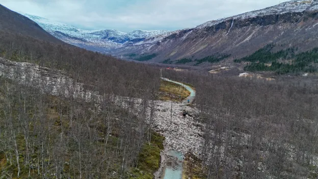 Viser steinras over lysl&oslash;ypa i Tromsdalen